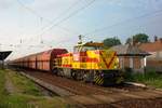 On 30 May 2010 MEG 210 speeds through Grosskorbetha with another coal train.