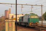 Alpha Trains, former R4C 2006 with railway engineering train passes Tilburg on 29 August 2013.