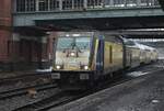 On a grey 13 February 2026 Metronom 246 006 enters Hamburg-Harburg with a train from Cuxhaven.