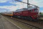 EBS V 200 507 stands with a rake of ex-DDR St�dte-Express coaches as one of 20 extra trains at Benesov u Prahy on 10 Septewmber 2022.