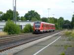 612 057 is driving in Oberkotzau on July 11th 2013.