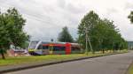 . The Stadler GTW 2/6 HLB 130 is running through Obererbach on June 27th, 2015.