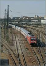 The DB 101 019-8  with an IC is leaving Heildelberg Hbf.