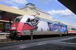 Bach Home? DB 101 070 in ice hockey team 'Mannheim Adler' livery calls at Mannheim Hbf on 3 July 2013.