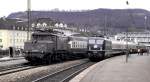 193 013-0 with Saturday schoolar train is waiting and 110 124-5 with a quicktrain is passing Geislingen/Steige, Narch 13th, 1982.
