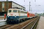 DB 110 412 hauls empty passenger stock through Recklinghausen Hbf on 24 February 1998. 