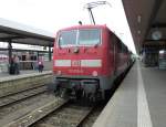 111 215-0 is standing in Nuremberg main station, June 23th 2013.