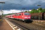 DB 111 062 leaves Weil-am-Rhein under a cloudy sky on 29 June 2013.