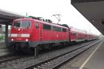 On 9 April 2014, 111 139 stands at Minden (Westfalen); the first coach behind the loco is an ex-DR coach.