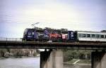111 030-3 at Donau river bridge, Ulm April 30, 2002.
