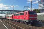 On 13 September 2019 DB 111 058 hauls her regional train out of Göppingen.