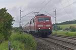 Out in the fields between Eubigheim and Hrischlanden this later morning the GfF class 111 200-2 is on it's way from Würzburg to Stuttgart with the RE8 line replacementtrain from TRI and Go Ahrad BW. 2023.8.27