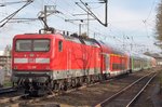 DB 112 159 quits Elmshorn on 28 April 2016. Note the Schleswig-Holstein livery on the coaches of the train.