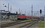The DB 112 102-9 wiht a RE in Rostock.