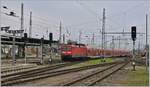 The DB 112 102-2 is leaving Rostock with a RE in direction of Berlin.