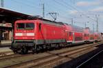 RE 20 to Uelzen via single track, quits Stendal on 4 April 2018 with 112 131 at the reins.