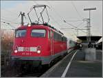 115 331-1 is running through the station Kln Messe/Deutz while hauling off the ICE 2  Brandenburg von der Havel  on November 8th, 2008.