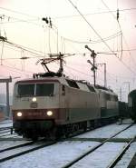 120 003-9 and 151 with testing heavy tains to stop and to start. At Regensburg January 31st, 1981.