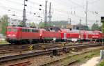 139 157-2 with 120 110-0 and double floor wagons at Ulm, June 2nd 2007. In the background is 234 292-1 waiting for the intercity train to Lindau.