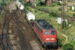 View from a bridge. DB 140 815 enters Halle (Saale) Gbf on 28 May 2005.