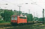 On 13 April 2000 DB 140 608 hauls an empty steel train through Köln West on this scanned photo.