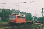 Scanned photo of 140 608 hauling an empty steel train through Köln West on 21 May 2005.