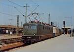 The DB 141 060-4 and an other one are arriving at the Basel Bad. Bf. Station. 

analog picture / 09.05.1984