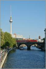 A 143 with a RE between Alexanderplatz and Friedrichstrae.