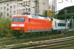 On 10 September 1999 DB Cargo 145 033 with NMBS-stock leaves aachen Hbf for Cologne.