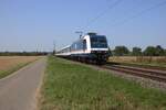 TRI 145 040 has an open door policy due to the warmth on 12 August 2025 whilst passing through Kaarst-Broicherheide.