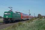 TRI 145 041 pushes an RE to Bremen Hbf through St.H�lfe on 23 April 2026.