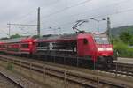 DB Regio 146 021 pushes an urban train out of Bad Schandau on 23 May 2023.