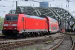 On 27 April 2018 in one of the last years of TRAXX hauled REs, 146 268 comes off the Hohenzollern bridge and enters Köln Hbf with an RE to Koblenz.