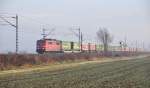 151 138-5 at Neu-Ulm Pfuhl in direction to Ulm in early morning of November 21st, 2009. It is a train with semitrailer on special wagons.