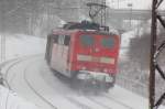 151 159-1 with helping by pushing a goods train at the Geislinger Steige to reach the top of the Swabian Alb, February 13th, 2009.