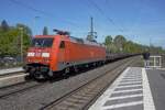 On 23 April 2026 DB Cargo 152 114 hauls  a steel train through Diepholz.