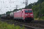 But for one wagon a tanktrain: DB 152 018 with mixed freight  passes through Gremberg on 17 July 2026 and gets photographed from a public parking lot.