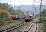 1016 036-4 with Eurocity is meeting 152 112-9 with the semitrailer-train with  Walter  semitrailers only, at Westerstetten Oct. 7th, 2010.