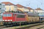 On 10 June 2009 DB 155 061 hauls a train of automotives through Regensburg Hbf.
