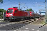 Erkner, DB 182 002-6 (91 80 6 182 002-6 D-DB) with the 11,51hrs RE 1 to Frankfurt/Oder, Beuststrae levelcrossing, June 2013