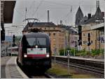 MRCE 182 536-3 (ES 64 U2-036) is arriving with the IC to Chur at the main station of Koblenz on June 25th, 2011.