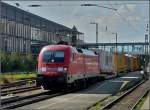 182 023-2 is hauling a freight train through the main station of Regensburg on September 11th, 2010.