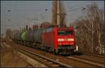 DB Schenker 185 154 with an tank car train on 04.03.2013 in Berlin-Karow