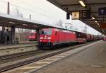 . 185 358-9 is hauling a goods train through the main station of Braunschweig on January 3rd, 2015.