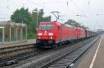On a rainy 31 May 2012 iron ore train with 185 367 speeds through Celle.