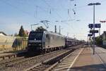 CapTrain 185 556 hauls a GEFOCO automotive train through Bad Krozingen on 30 May 2019.