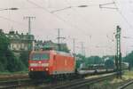 On 13 April 2001 DB 185 027 hauls a steel train  through Köln West.