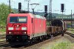 On 3 June 2019 DB Cargo 185 291 hauls a mixed freight through Aschaffenburg.