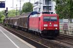DB Cargo 185 276 hauls a block train through Köln Süd on 8 June 2019.