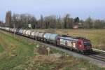 Chequered carreers: 482 046 began her life with SBB Cargo, butr later on was sold to the freight branch of IGE International, whioch gave the loco this smart dark ruby red with advertising livery. In December 2023 IGE discarded off her freight division and the loco was sold to BBL, that kept the smart livery for now. On 20 March 2024 your photographer went over the Moon after succeeding this picture.